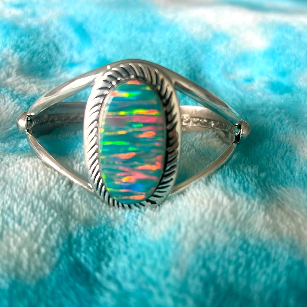 Sterling silver bangle cuff bracelet w faux fire opal inlay. Beautiful.